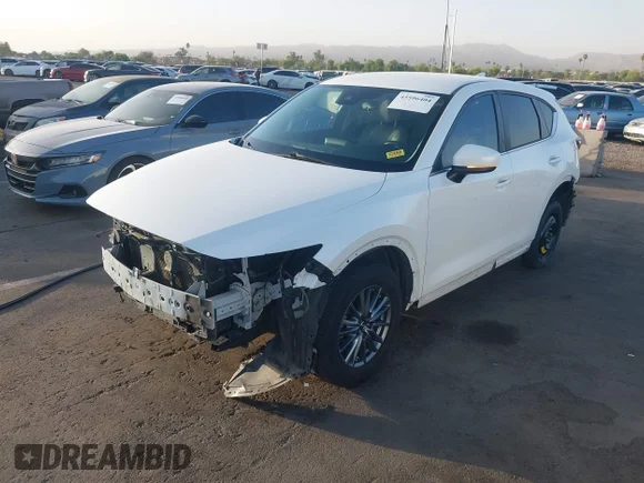 ✅ 2017 Mazda CX-5 Touring • VIN: JM3KFACL6H0161412 • Лот: 45596404. Опубликован ранее на IAAI с пробегом 116 934 миль. Бесплатный доступ к архиву аукционных продаж из США и подробный отчёт об истории автомобиля на DreamBid. Изображение 2.