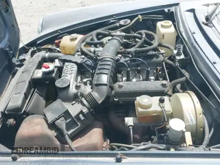 ✅ 1986 Alfa Romeo Spider Veloce • VIN: ZARBA541XG1037637 • Лот: 42680315. Опубликован ранее на IAAI с пробегом 124 876 миль. Бесплатный доступ к архиву аукционных продаж из США и подробный отчёт об истории автомобиля на DreamBid. Изображение 13.