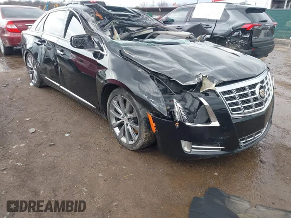 ✅ 2013 Cadillac XTS Luxury • VIN: 2G61R5S35D9228556 • Lot: 44576390. Listed on IAAI with 195,933 mi. Free auction sales archive from the USA and detailed vehicle history report at DreamBid. Image 1.