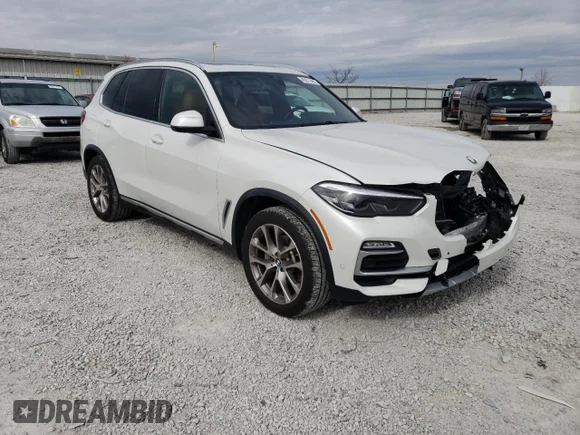 ✅ 2021 BMW X5 xDrive40i • VIN: 5UXCR6C03M9E81012 • Лот: 45271483. Опубликован ранее на Copart с пробегом 26 870 миль. Бесплатный доступ к архиву аукционных продаж из США и подробный отчёт об истории автомобиля на DreamBid. Изображение 4.