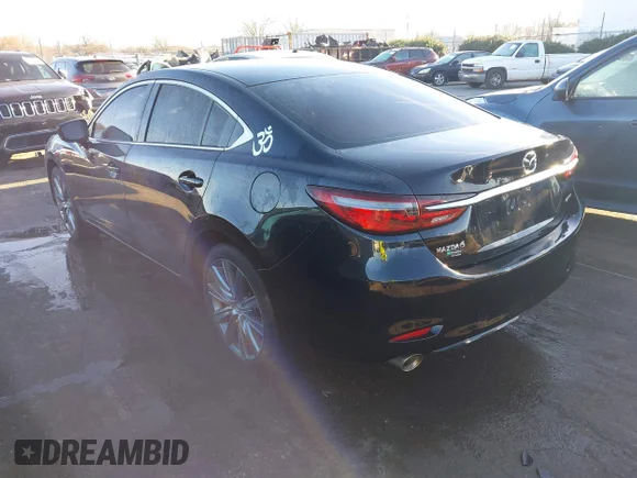 ✅ 2021 Mazda 6 Touring • VIN: JM1GL1VM4M1602360 • Лот: 41453648. Опубліковано раніше на IAAI з пробігом 105 634 миль. Безкоштовний доступ до архіву аукціонних продажів зі США та докладний звіт про історію автомобіля на DreamBid. Зображення 3.