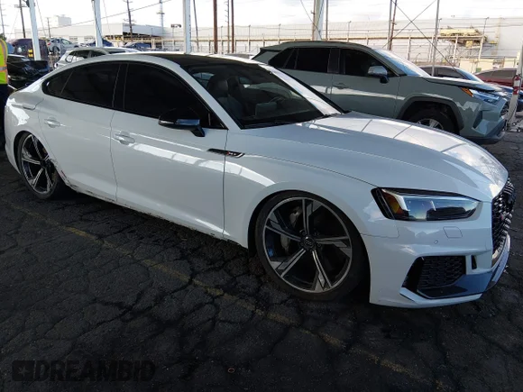 ✅ 2019 Audi RS 5 Sportback • VIN: WUABWCF50KA900974 • Lot: 44064242. Listed on IAAI with 89,516 mi. Free auction sales archive from the USA and detailed vehicle history report at DreamBid. Image 1.