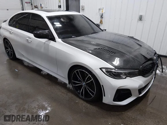 ✅ 2021 BMW 3 Series M340i xDrive • VIN: 3MW5U9J00M8B62121 • Lot: 44311565. Listed on IAAI with 39,090 mi. Free auction sales archive from the USA and detailed vehicle history report at DreamBid. Image 1.