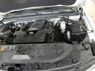 2018 Chevrolet Suburban LS z VIN 1GNSKGECXJR137675, wystawiony jako Copart lot #71902125 z przebiegiem 128 007 mil mil oraz Szkoda całkowita • Salvage title. Historia ofert i sprzedaży dostępna na DreamBid. Obrazek 16.