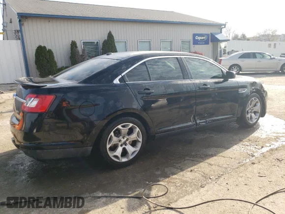 ✅ 2012 Ford Taurus SEL • VIN: 1FAHP2EW4CG114169 • Lot: 77408214. Listed on Copart with 248,732 mi. Free auction sales archive from the USA and detailed vehicle history report at DreamBid. Image 3.