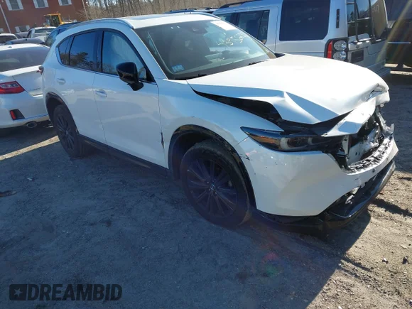 ✅ 2022 Mazda CX-5 2.5 Turbo • VIN: JM3KFBAY5N0543091 • Lot: 43956235. Wystawiony na IAAI z przebiegiem 67 195 mil. Bezpłatny archiwum sprzedaży aukcyjnych z USA i szczegółowy raport historii pojazdu na DreamBid. Zdjęcie 1.