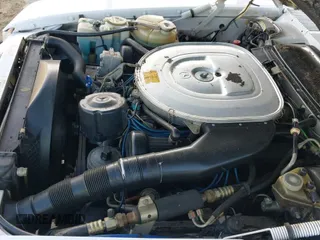 ✅ 1987 Mercedes-Benz 560 SL • VIN: WDBBA48D6HA058803 • Lot: 43574212. Wystawiony na IAAI z przebiegiem 103 786 mil. Bezpłatny archiwum sprzedaży aukcyjnych z USA i szczegółowy raport historii pojazdu na DreamBid. Zdjęcie 19.