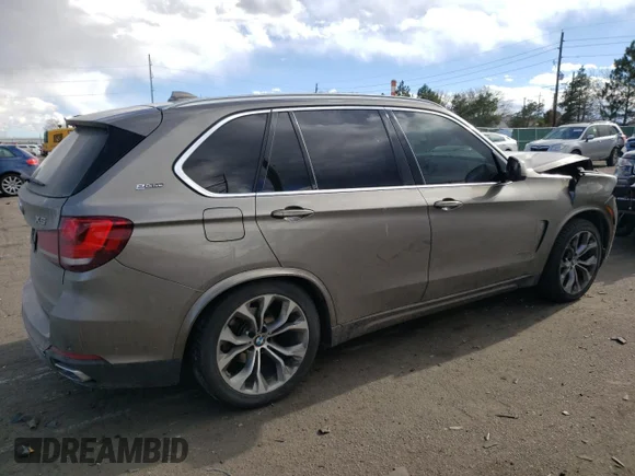 ✅ 2018 BMW X5 xDrive40e • VIN: 5UXKT0C57J0W02093 • Лот: 70038452. Опубліковано раніше на Copart з пробігом 46 408 миль. Безкоштовний доступ до архіву аукціонних продажів зі США та докладний звіт про історію автомобіля на DreamBid. Зображення 3.