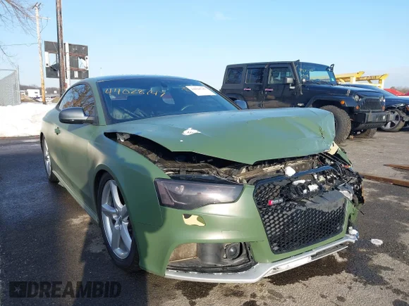 ✅ 2013 Audi RS 5 • VIN: WUAC6AFR0DA902819 • Lot: 44028747. Listed on IAAI with 63,139 mi. Free auction sales archive from the USA and detailed vehicle history report at DreamBid. Image 1.
