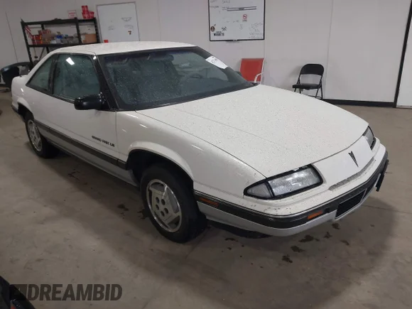 ✅ 1989 Pontiac Grand Prix • VIN: 1G2WK14W7KF255774 • Lot: 42116059. Listed on IAAI with 103,588 mi. Free auction sales archive from the USA and detailed vehicle history report at DreamBid. Image 1.