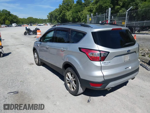 ✅ 2018 Ford Escape SEL • VIN: 1FMCU9HD8JUA51734 • Lot: 45458256. Wystawiony na IAAI z przebiegiem 87 744 mil. Bezpłatny archiwum sprzedaży aukcyjnych z USA i szczegółowy raport historii pojazdu na DreamBid. Zdjęcie 3.