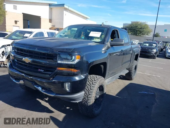 ✅ 2018 Chevrolet Silverado 1500 LT • VIN: 3GCUKREC1JG295562 • Lot: 44186860. Wystawiony na IAAI z przebiegiem 40 503 mil. Bezpłatny archiwum sprzedaży aukcyjnych z USA i szczegółowy raport historii pojazdu na DreamBid. Zdjęcie 2.