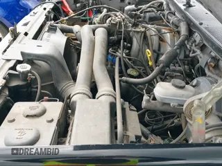 ✅ 1990 Ford F-150 • VIN: 1FTEX15N0LKA06904 • Lot: 42603529. Listed on IAAI with 473,180 mi. Free auction sales archive from the USA and detailed vehicle history report at DreamBid. Image 13.