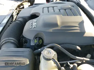 ✅ 2014 Dodge Challenger SXT • VIN: 2C3CDYAG1EH277288 • Lot: 43626237. Listed on IAAI with 104,731 mi. Free auction sales archive from the USA and detailed vehicle history report at DreamBid. Image 20.