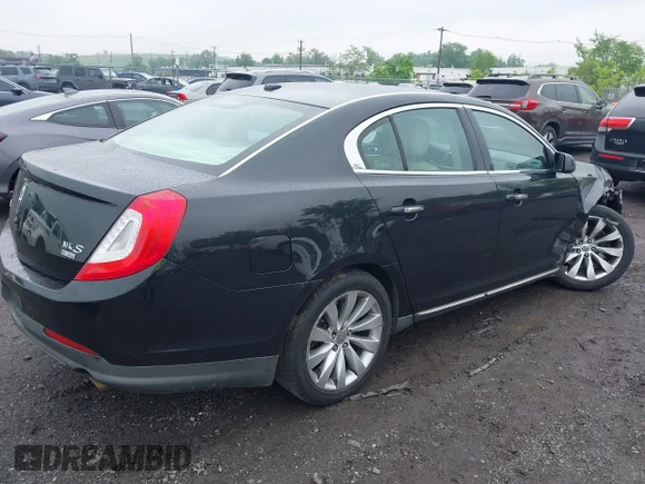 ✅ 2014 Lincoln MKS • VIN: 1LNHL9EK0EG601198 • Лот: 42275502. Опубліковано раніше на IAAI з пробігом 191 223 миль. Безкоштовний доступ до архіву аукціонних продажів зі США та докладний звіт про історію автомобіля на DreamBid. Зображення 4.