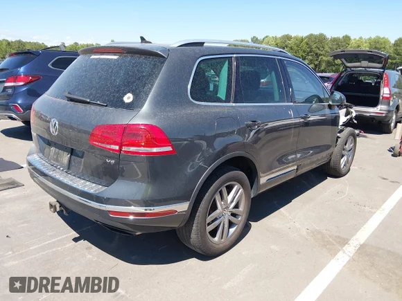 ✅ 2015 Volkswagen Touareg Lux • VIN: WVGEF9BP4FD005105 • Lot: 45382918. Wystawiony na IAAI z przebiegiem 172 719 mil. Bezpłatny archiwum sprzedaży aukcyjnych z USA i szczegółowy raport historii pojazdu na DreamBid. Zdjęcie 4.