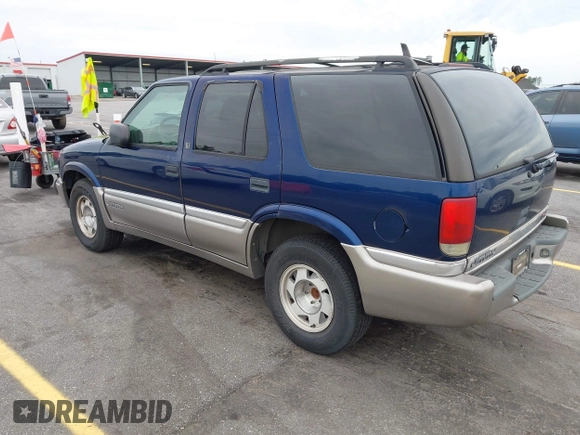 ✅ 1999 GMC Jimmy SLE • VIN: 1GKCS13W6X2500762 • Лот: 42197783. Опубликован ранее на IAAI с пробегом 238 250 миль. Бесплатный доступ к архиву аукционных продаж из США и подробный отчёт об истории автомобиля на DreamBid. Изображение 3.