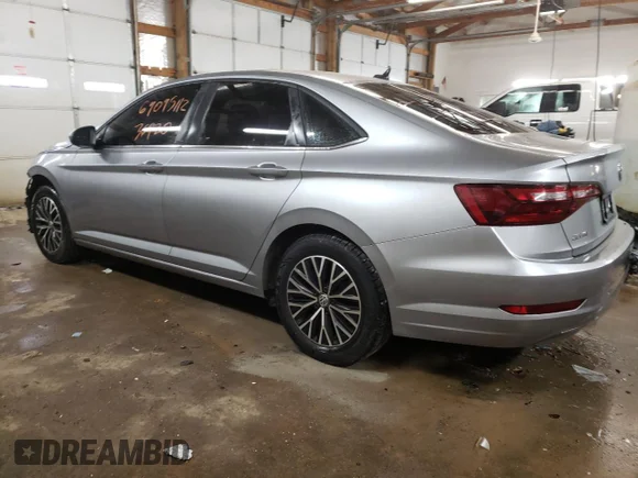 ✅ 2021 Volkswagen Jetta S • VIN: 3VWC57BUXMM057149 • Lot: 69095112. Wystawiony na Copart z przebiegiem 36 920 mil. Bezpłatny archiwum sprzedaży aukcyjnych z USA i szczegółowy raport historii pojazdu na DreamBid. Zdjęcie 2.