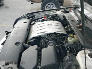 ✅ 2004 Cadillac DeVille DTS • VIN: 1G6KF579X4U238691 • Lot: 41367367. Listed on IAAI with 69,902 mi. Free auction sales archive from the USA and detailed vehicle history report at DreamBid. Image 12.