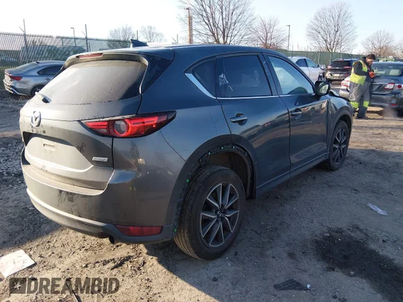 ✅ 2017 Mazda CX-5 Grand Touring • VIN: JM3KFADL5H0188602 • Лот: 44639394. Опубліковано раніше на IAAI з пробігом 145 199 миль. Безкоштовний доступ до архіву аукціонних продажів зі США та докладний звіт про історію автомобіля на DreamBid. Зображення 4.