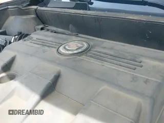 ✅ 2013 Cadillac SRX • VIN: 3GYFNAE39DS617135 • Lot: 42355527. Listed on IAAI with 112,052 mi. Free auction sales archive from the USA and detailed vehicle history report at DreamBid. Image 12.