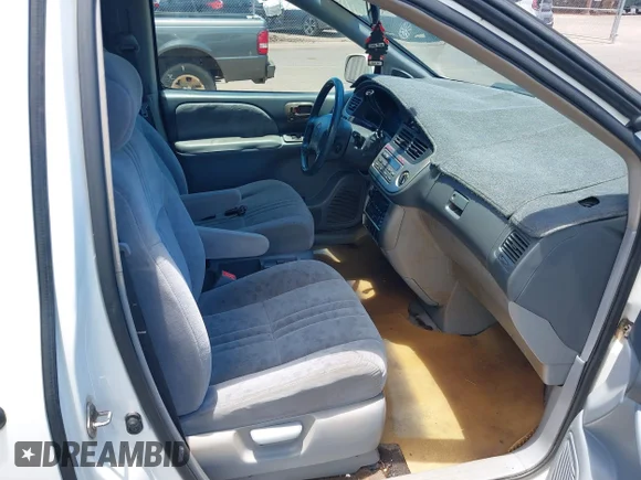 ✅ 2002 Toyota Sienna LE • VIN: 4T3ZF13C12U452393 • Lot: 45388291. Wystawiony na IAAI z przebiegiem 219 951 mil. Bezpłatny archiwum sprzedaży aukcyjnych z USA i szczegółowy raport historii pojazdu na DreamBid. Zdjęcie 5.