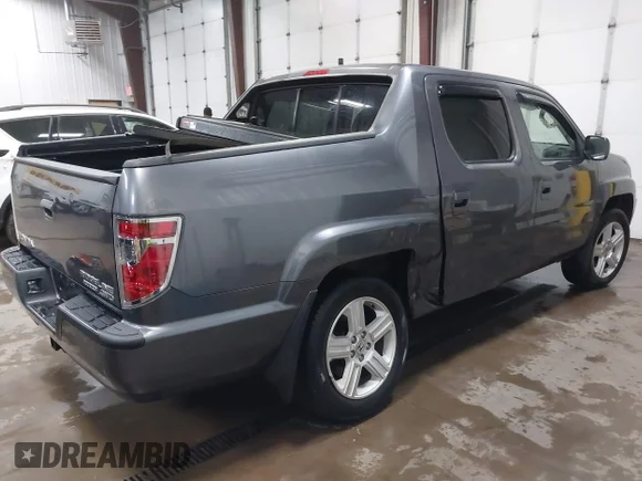 ✅ 2014 Honda Ridgeline RTL • VIN: 5FPYK1F58EB501255 • Лот: 41691804. Опубликован ранее на IAAI с пробегом 114 515 миль. Бесплатный доступ к архиву аукционных продаж из США и подробный отчёт об истории автомобиля на DreamBid. Изображение 4.