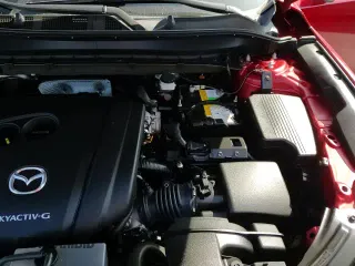 ✅ 2020 Mazda CX-5 Grand Touring • VIN: JM3KFADM7L1819894 • Lot: 82729645. Wystawiony na Copart z przebiegiem 31 336 mil. Bezpłatny archiwum sprzedaży aukcyjnych z USA i szczegółowy raport historii pojazdu na DreamBid. Zdjęcie 14.