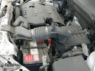 ✅ 2015 Mitsubishi Outlander GT • VIN: 4A4AP4AWXFE046790 • Lot: 42420600. Listed on IAAI with 59,096 mi. Free auction sales archive from the USA and detailed vehicle history report at DreamBid. Image 12.