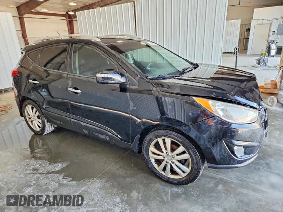 ✅ 2012 Hyundai Tucson Limited • VIN: KM8JU3AC9CU512898 • Lot: 47348986. Wystawiony na Copart z przebiegiem 62 862 mil. Bezpłatny archiwum sprzedaży aukcyjnych z USA i szczegółowy raport historii pojazdu na DreamBid. Zdjęcie 4.