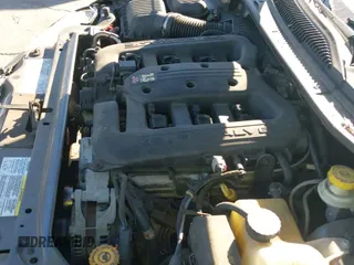 ✅ 2004 Chrysler 300M M • VIN: 2C3AE66G04H604215 • Lot: 43512057. Wystawiony na IAAI z przebiegiem 62 562 mil. Bezpłatny archiwum sprzedaży aukcyjnych z USA i szczegółowy raport historii pojazdu na DreamBid. Zdjęcie 19.