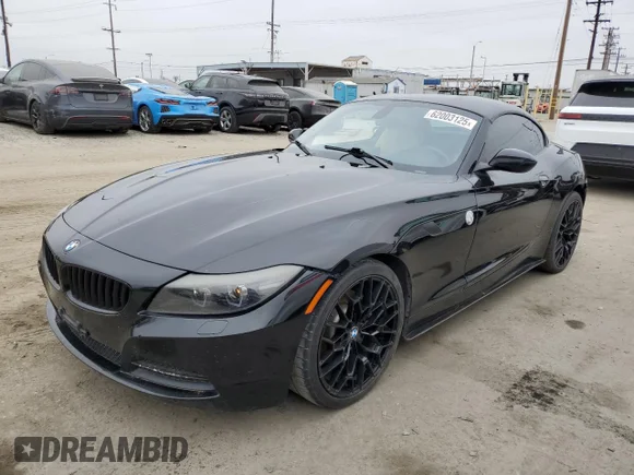 ✅ 2012 BMW Z4 sDrive28i • VIN: WBALL5C56CE716558 • Lot: 62003125. Wystawiony na Copart z przebiegiem 93 438 mil. Bezpłatny archiwum sprzedaży aukcyjnych z USA i szczegółowy raport historii pojazdu na DreamBid. Zdjęcie 1.