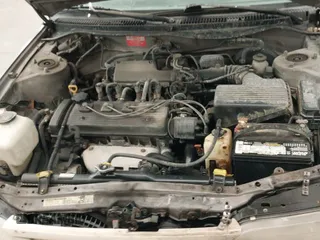 ✅ 1995 Toyota Corolla • VIN: 1NXAE04B7SZ351688 • Lot: 42347428. Wystawiony na IAAI z przebiegiem 176 013 mil. Bezpłatny archiwum sprzedaży aukcyjnych z USA i szczegółowy raport historii pojazdu na DreamBid. Zdjęcie 13.