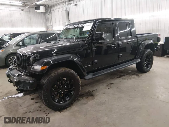 ✅ 2023 Jeep Gladiator Overland • VIN: 1C6JJTFM3PL585718 • Lot: 44540033. Listed on IAAI with 29,992 mi. Free auction sales archive from the USA and detailed vehicle history report at DreamBid. Image 2.