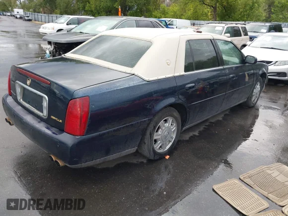 ✅ 2002 Cadillac DeVille • VIN: 1G6KD54Y02U142065 • Lot: 37633727. Wystawiony na IAAI z przebiegiem 162 263 mil. Bezpłatny archiwum sprzedaży aukcyjnych z USA i szczegółowy raport historii pojazdu na DreamBid. Zdjęcie 4.