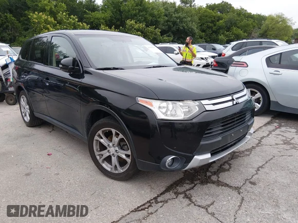 ✅ 2015 Mitsubishi Outlander SE • VIN: JA4AD3A39FZ013718 • Lot: 45080439. Listed on IAAI with 141,150 mi. Free auction sales archive from the USA and detailed vehicle history report at DreamBid. Image 1.
