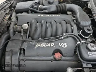 ✅ 1997 Jaguar XK • VIN: SAJGX5747VC007213 • Lot: 45953175. Wystawiony na Copart z przebiegiem 82 461 mil. Bezpłatny archiwum sprzedaży aukcyjnych z USA i szczegółowy raport historii pojazdu na DreamBid. Zdjęcie 11.