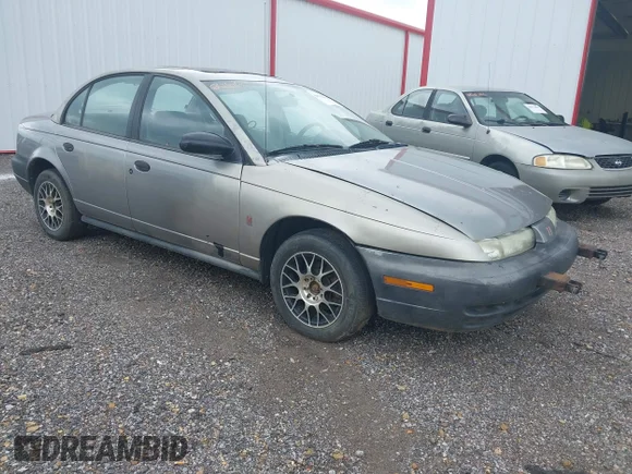 ✅ 1999 Saturn SL • VIN: 1G8ZG5286XZ188980 • Lot: 44702660. Listed on IAAI with 259,778 mi. Free auction sales archive from the USA and detailed vehicle history report at DreamBid. Image 1.