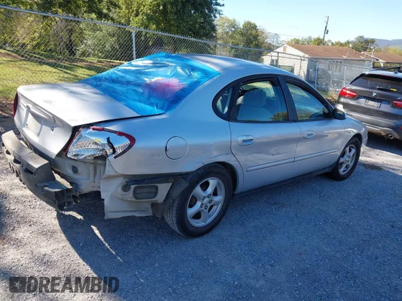 ✅ 2004 Ford Taurus SE • VIN: 1FAFP53U54A103261 • Lot: 43413807. Listed on IAAI with 178,983 mi. Free auction sales archive from the USA and detailed vehicle history report at DreamBid. Image 4.