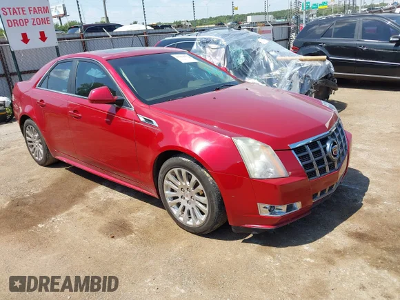 ✅ 2012 Cadillac CTS Performance • VIN: 1G6DJ5E39C0115721 • Lot: 42994072. Wystawiony na IAAI z przebiegiem 163 367 mil. Bezpłatny archiwum sprzedaży aukcyjnych z USA i szczegółowy raport historii pojazdu na DreamBid. Zdjęcie 1.