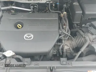 ✅ 2013 Mazda 5 Sport • VIN: JM1CW2BL0D0145446 • Лот: 42681206. Опубликован ранее на IAAI с пробегом 165 153 миль. Бесплатный доступ к архиву аукционных продаж из США и подробный отчёт об истории автомобиля на DreamBid. Изображение 13.