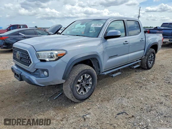 ✅ 2018 Toyota Tacoma TRD Sport • VIN: 5TFCZ5AN7JX122079 • Лот: 55862006. Опубликован ранее на Copart с пробегом 190 420 миль. Бесплатный доступ к архиву аукционных продаж из США и подробный отчёт об истории автомобиля на DreamBid. Изображение 1.