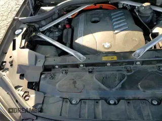 ✅ 2023 BMW X5 xDrive45e • VIN: 5UXTA6C09P9P55659 • Lot: 89814655. Listed on Copart with 76,577 mi. Free auction sales archive from the USA and detailed vehicle history report at DreamBid. Image 14.