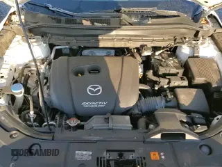 ✅ 2019 Mazda CX-5 Grand Touring • VIN: JM3KFBDM2K0593340 • Лот: 93628585. Опубликован ранее на Copart с пробегом 56 180 миль. Бесплатный доступ к архиву аукционных продаж из США и подробный отчёт об истории автомобиля на DreamBid. Изображение 14.