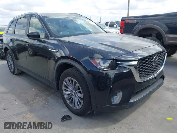 ✅ 2026 Mazda CX-90 Select • VIN: JM3KKAHD1T1353126 • Lot: 44516480. Listed on IAAI with 7,935 mi. Free auction sales archive from the USA and detailed vehicle history report at DreamBid. Image 1.