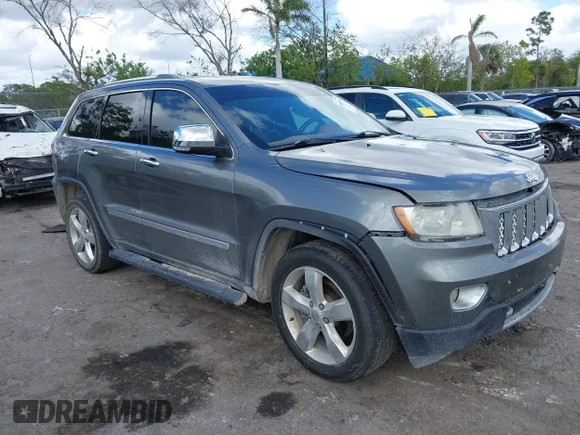 ✅ 2012 Jeep Grand Cherokee Overland • VIN: 1C4RJECT0CC277483 • Lot: 44660740. Wystawiony na IAAI z przebiegiem 146 891 mil. Bezpłatny archiwum sprzedaży aukcyjnych z USA i szczegółowy raport historii pojazdu na DreamBid. Zdjęcie 1.