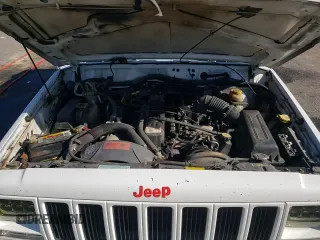 ✅ 2001 Jeep Cherokee Limited • VIN: 1J4FT58S61L513297 • Lot: 86021154. Listed on Copart with 253,694 mi. Free auction sales archive from the USA and detailed vehicle history report at DreamBid. Image 14.