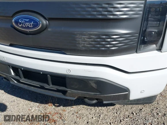 ✅ 2022 Ford F-150 Lightning XLT • VIN: 1FTVW1ELXNWG12806 • Lot: 44765496. Wystawiony na IAAI z przebiegiem 17 314 mil. Bezpłatny archiwum sprzedaży aukcyjnych z USA i szczegółowy raport historii pojazdu na DreamBid. Zdjęcie 6.