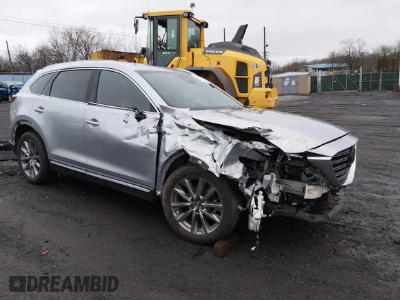 ✅ 2021 Mazda CX-9 Grand Touring • VIN: JM3TCBDY2M0512582 • Lot: 44676788. Wystawiony na IAAI z przebiegiem 90 134 mil. Bezpłatny archiwum sprzedaży aukcyjnych z USA i szczegółowy raport historii pojazdu na DreamBid. Zdjęcie 1.