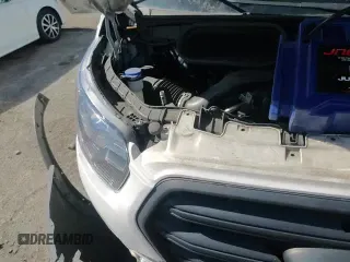 ✅ 2020 Ford Transit Cargo • VIN: 1FTBR1C86LKB67364 • Lot: 87060335. Listed on Copart with 88,967 mi. Free auction sales archive from the USA and detailed vehicle history report at DreamBid. Image 13.